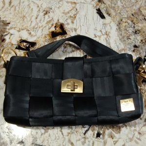 Harvey's seatbelt clutch purse